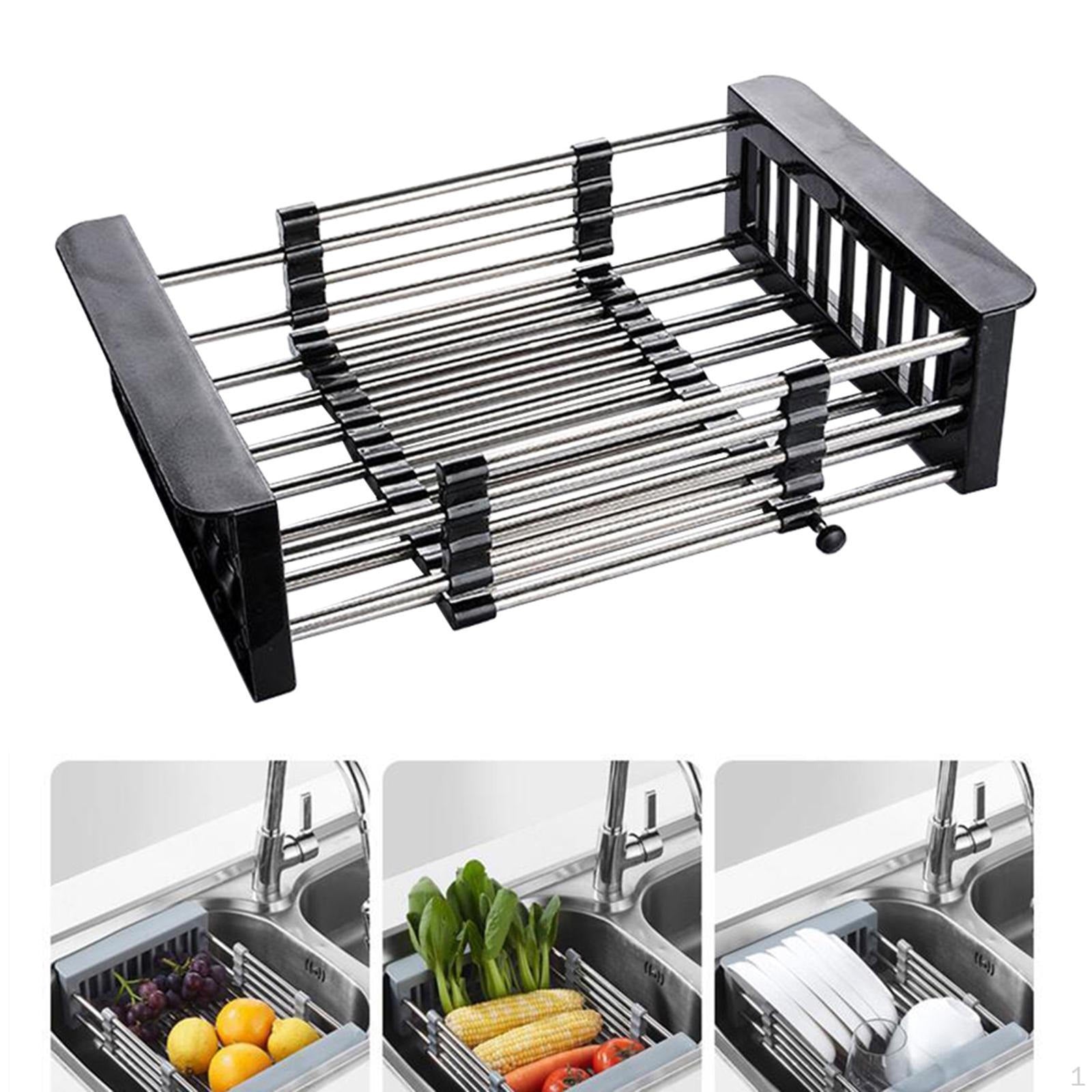 a stainless steel sink rack holding plates, fruits and vegetables